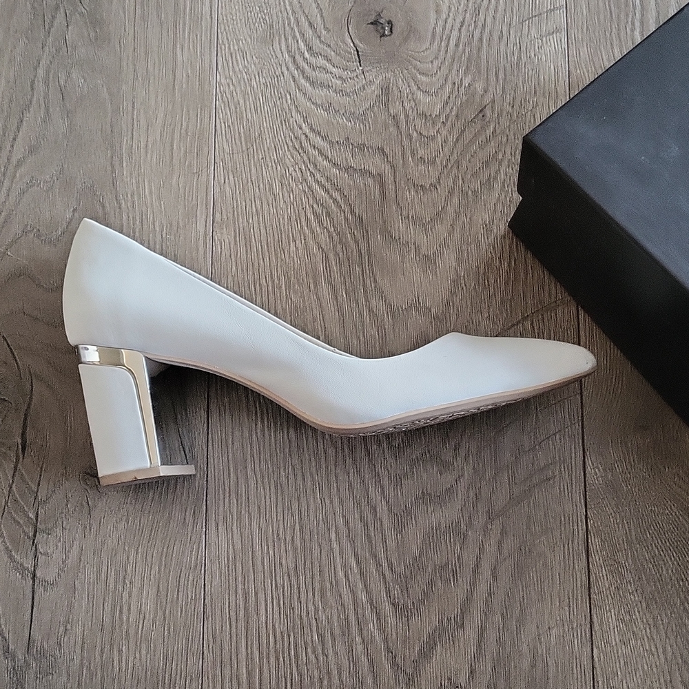 DKNY white heels worn twice.